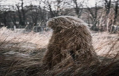 Special-camouflage-ghillie-suit-for-military-snipers-and-intelligence-agents.-In-field-conditions