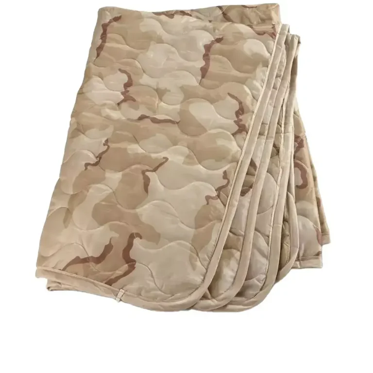 a folded Woobie blanket in a desert camouflage pattern